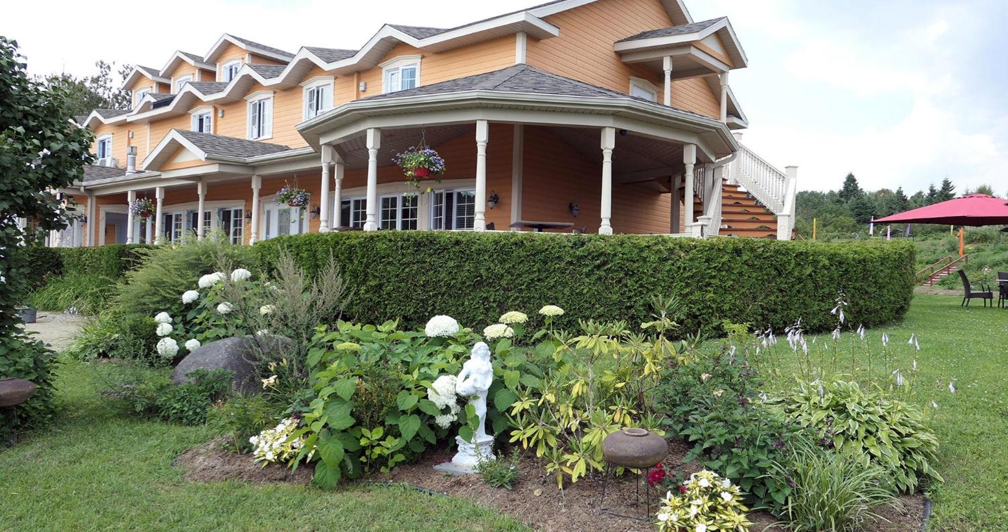 Auberge La Daina Baie-Saint-Paul Bagian luar foto